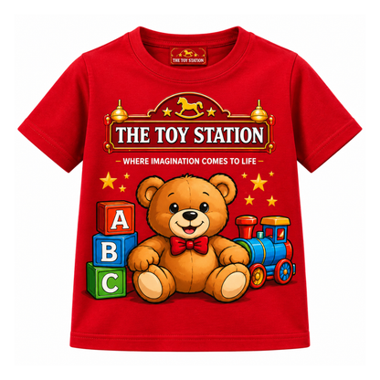 Red kids t-shirt with teddy bear, ABC blocks, and train, 'The Toy Station' design