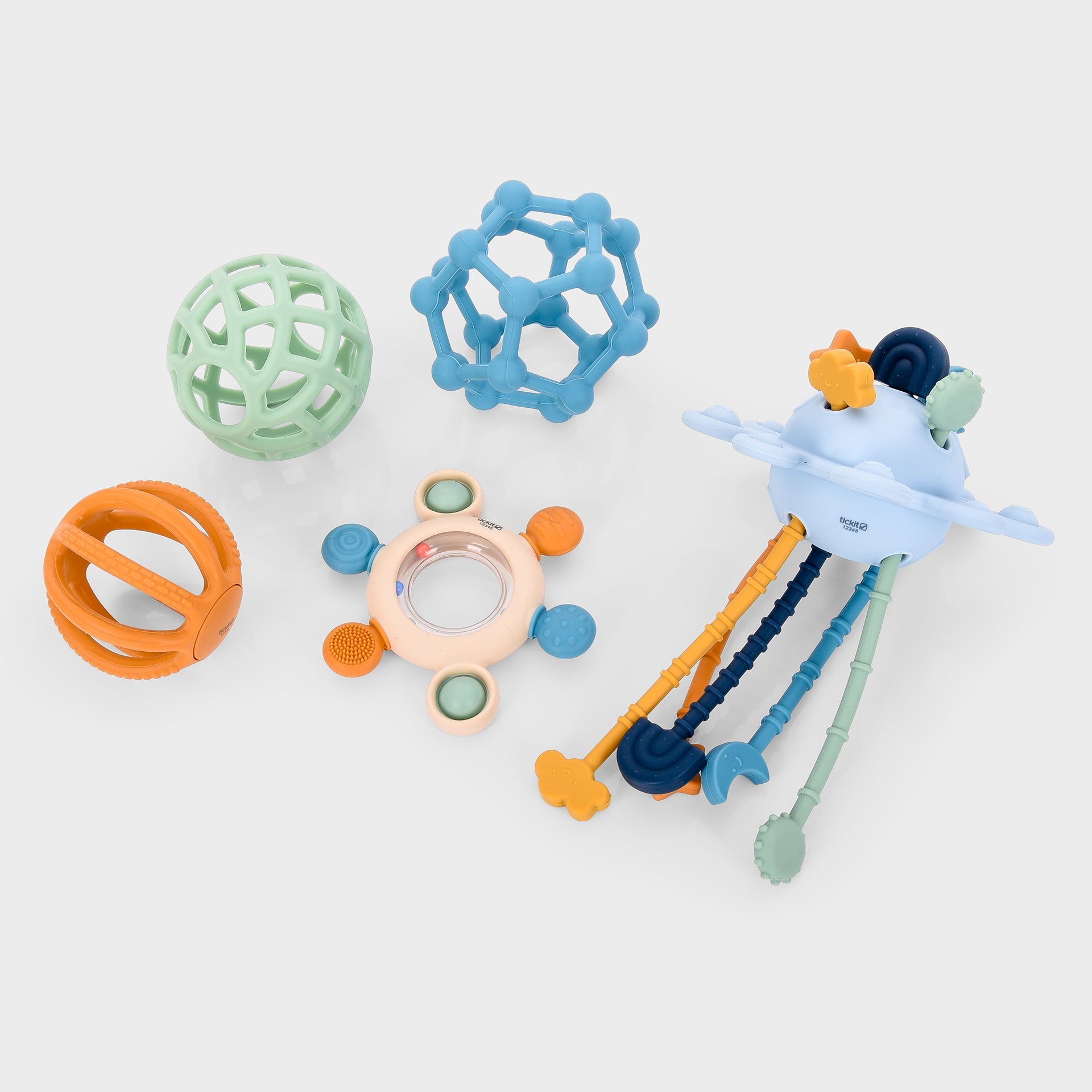 Colorful baby sensory toys including teething balls, textured rings, and a multi-texture activity toy for infant development