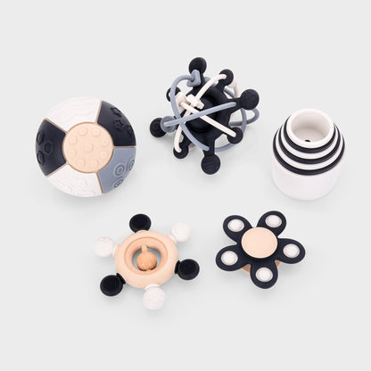Modern baby sensory toys with textured silicone, wooden rings, and pop-it fidget elements for tactile play