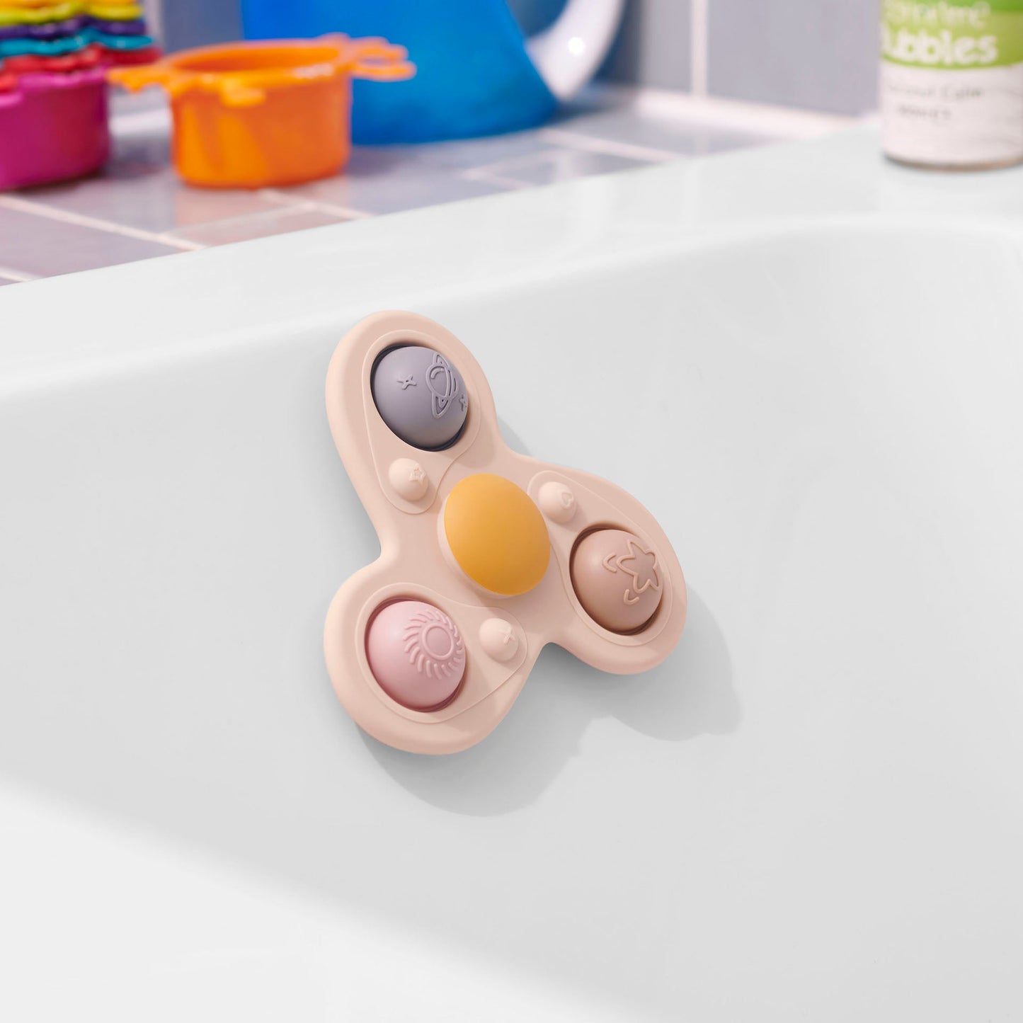 Colorful bath toy with sensory buttons for baby playtime