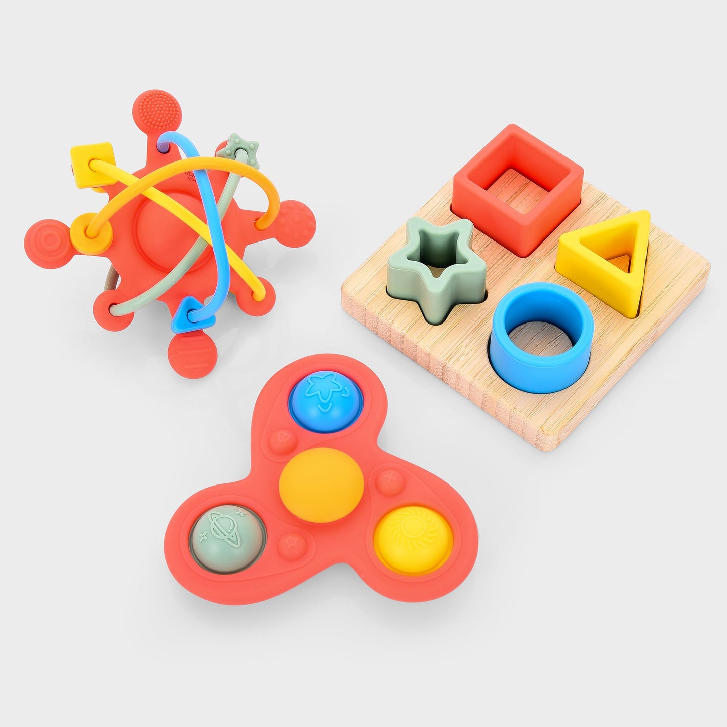 Colorful baby sensory toys: shape sorter, fidget spinner, and teether rattle for early learning and development