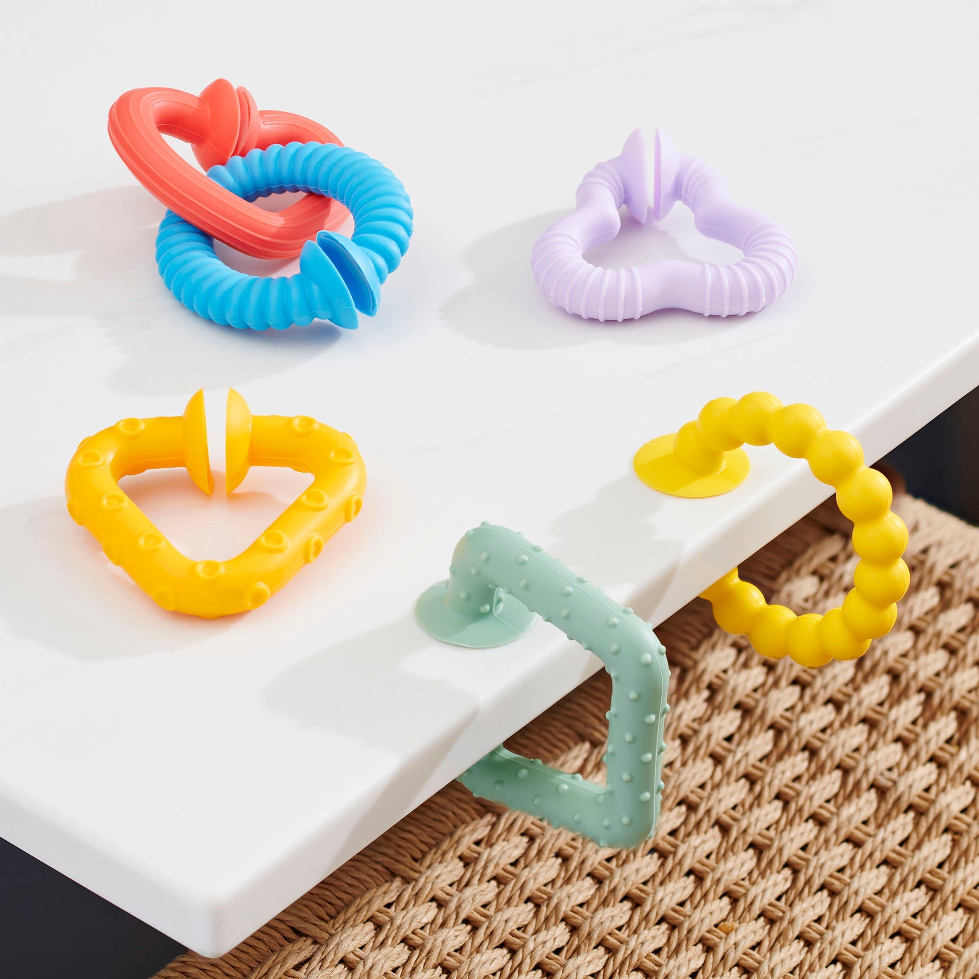 Colorful baby teething rings with suction cups for safe play and soothing gums